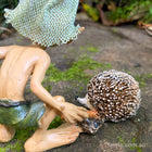 Pixie Poking his little Hedgehog Friend with a Stick