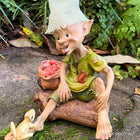 Pixie Sitting with a Bag of Apples and his Little Frog Friend