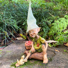 Pixie Sitting with a Bag of Apples and his Little Frog Friend