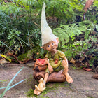 Pixie Sitting with a Bag of Apples and his Little Frog Friend
