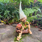 Pixie Sitting with a Bag of Apples and his Little Frog Friend
