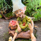 Pixie Sitting with a Bag of Apples and his Little Frog Friend