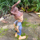 Little Pixie Guy just noticing he has a Rip in his Pants