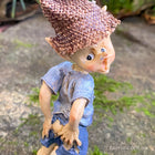 Little Pixie Guy just noticing he has a Rip in his Pants