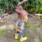 Little Pixie Guy just noticing he has a Rip in his Pants