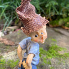 Little Pixie Guy just noticing he has a Rip in his Pants
