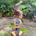 Little Pixie Guy just noticing he has a Rip in his Pants