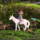 Pixie boy Sitting on a Unicorn Friend