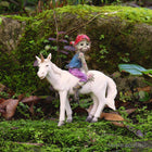 Pixie boy Sitting on a Unicorn Friend