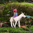 Pixie boy Sitting on a Unicorn Friend