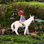 Pixie boy Sitting on a Unicorn Friend