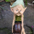 Naughty Pixie trying to Pull the Shell off a Snail