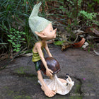 Naughty Pixie trying to Pull the Shell off a Snail