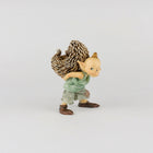 Pixie Carrying a Hedgehog