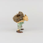 Pixie Carrying a Hedgehog