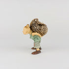Pixie Carrying a Hedgehog