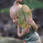 Shy Pixie trying to Hide behind a Leaf
