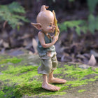 Shy Pixie trying to Hide behind a Leaf