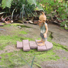 Pixie Boy confused whilst Playing Hopscotch