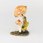 Frog Climbing up a  Mushroom with Lady Bug