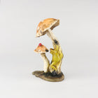 Frog Climbing up a  Mushroom with Lady Bug