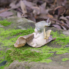 Baby Fairy Asleep on a Leaf next to her little Puppy Friend