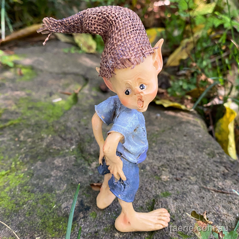 Little Pixie Guy just noticing he has a Rip in his Pants