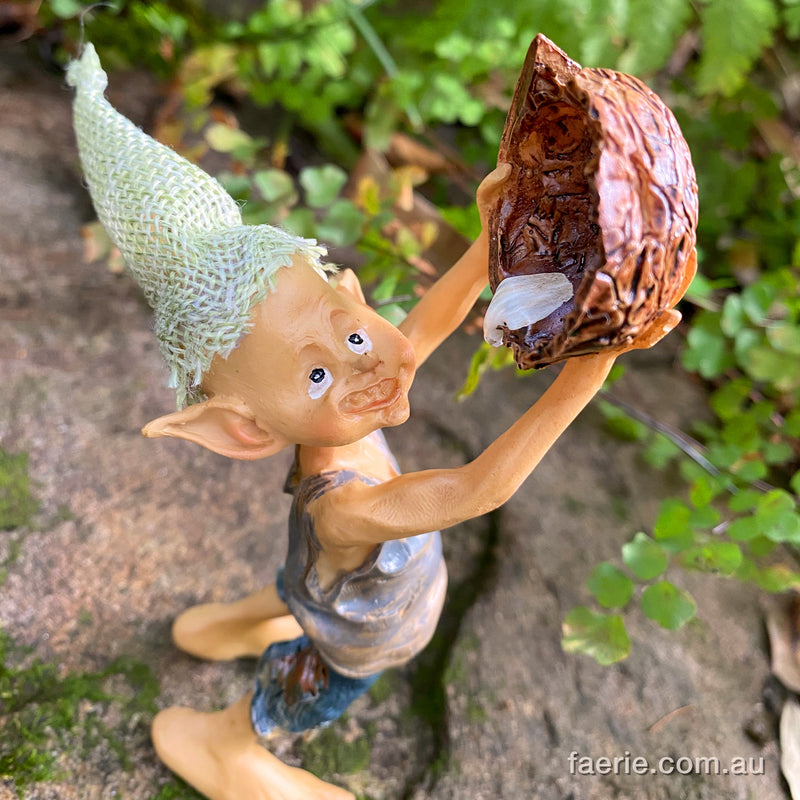 Pixie Boy Drinking from a Nut