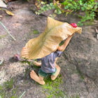 Pixie Brothers trying to Shelter from the Rain Under a Leaf