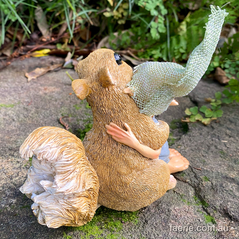 Pixie Boy giving a Cuddle to his Squirrel Friend