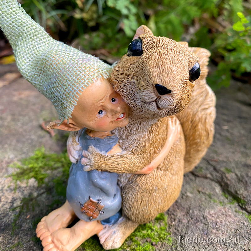 Pixie Boy giving a Cuddle to his Squirrel Friend