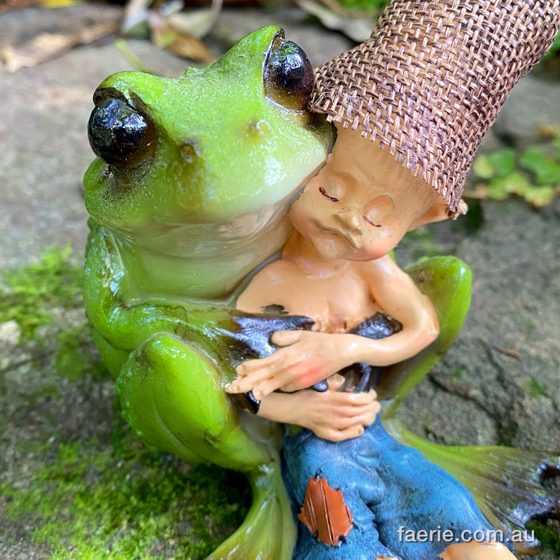 Pixie Boy getting a Cuddle from his Frog Friend