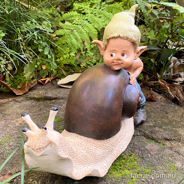 Larger Pixie pushing his Snail Friend