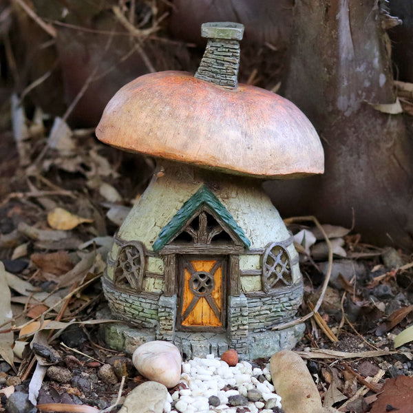 fairy mushroom house in garden