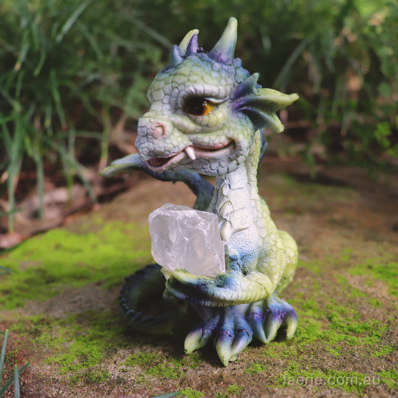 Dragon holding a Clear White Rock 12cm