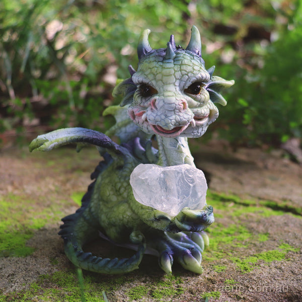 Dragon holding a Clear White Rock 12cm