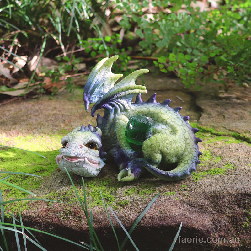 Dragon holding a Opaque Green Rock 12cm