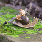 Pixie Giving a Snail a little Push Along