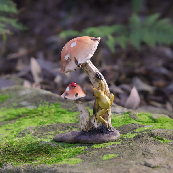 Frog Climbing up a  Mushroom with Lady Bug