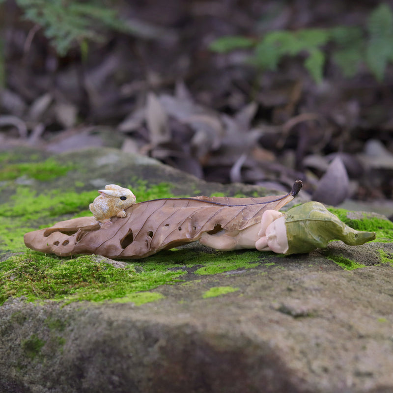 Fairy Baby Asleep under a Leaf next to a little Bunny