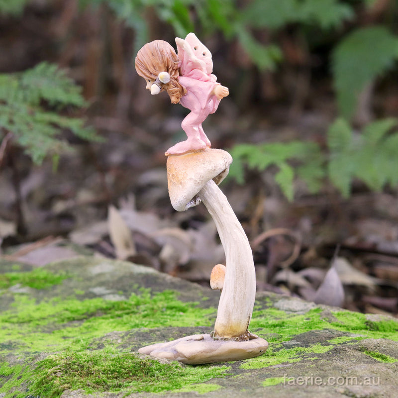 Little Fairy Child Leaping off a Mushroom