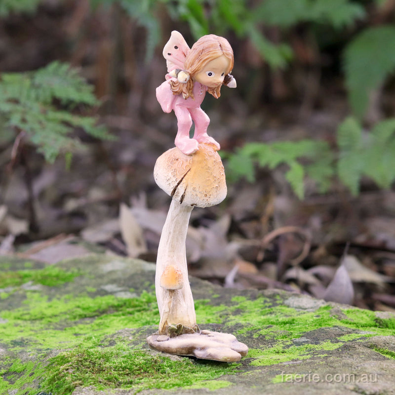 Little Fairy Child Leaping off a Mushroom