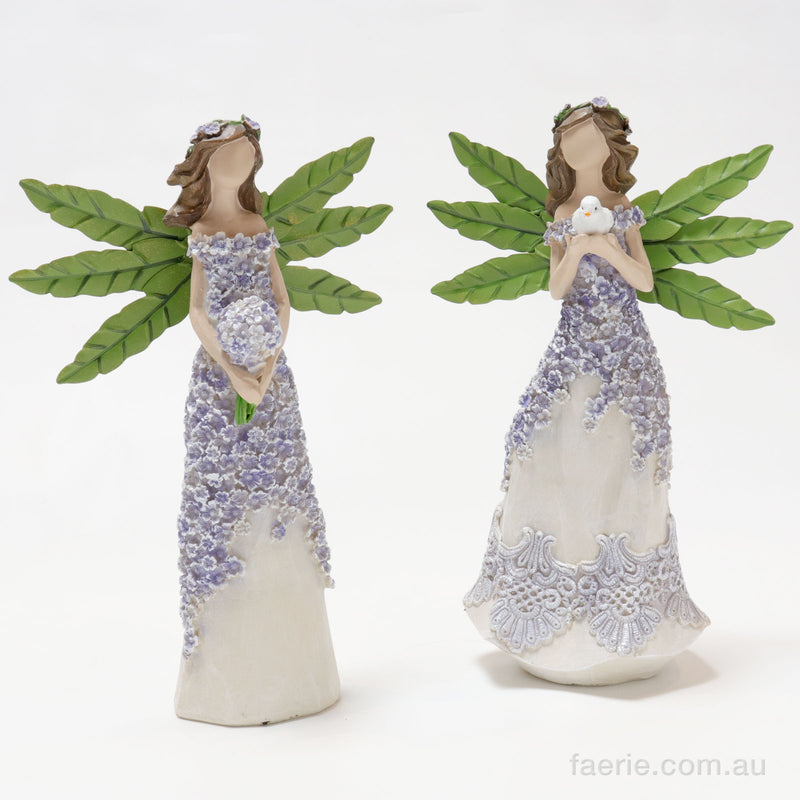 Two Purple Flower Fairies - Holding a Contented Dove and Holding a Bouquet - Figurine