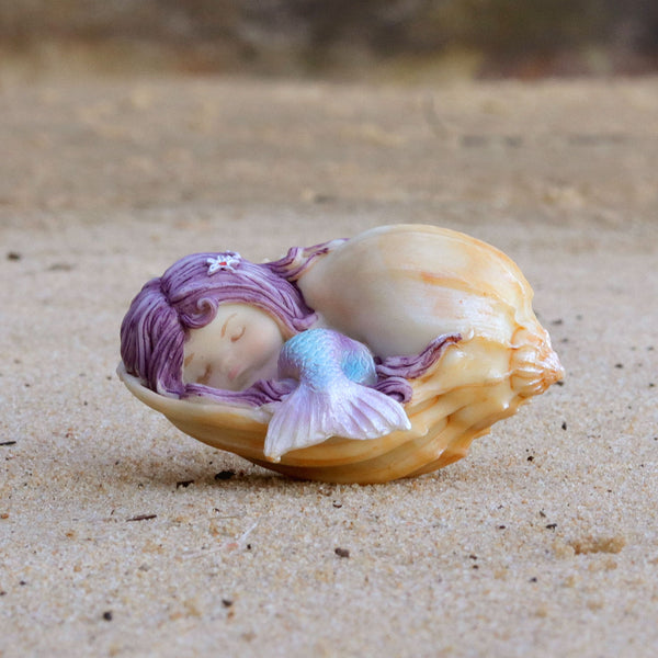 Cute Mermaid Sleeping in a Conch Shell
